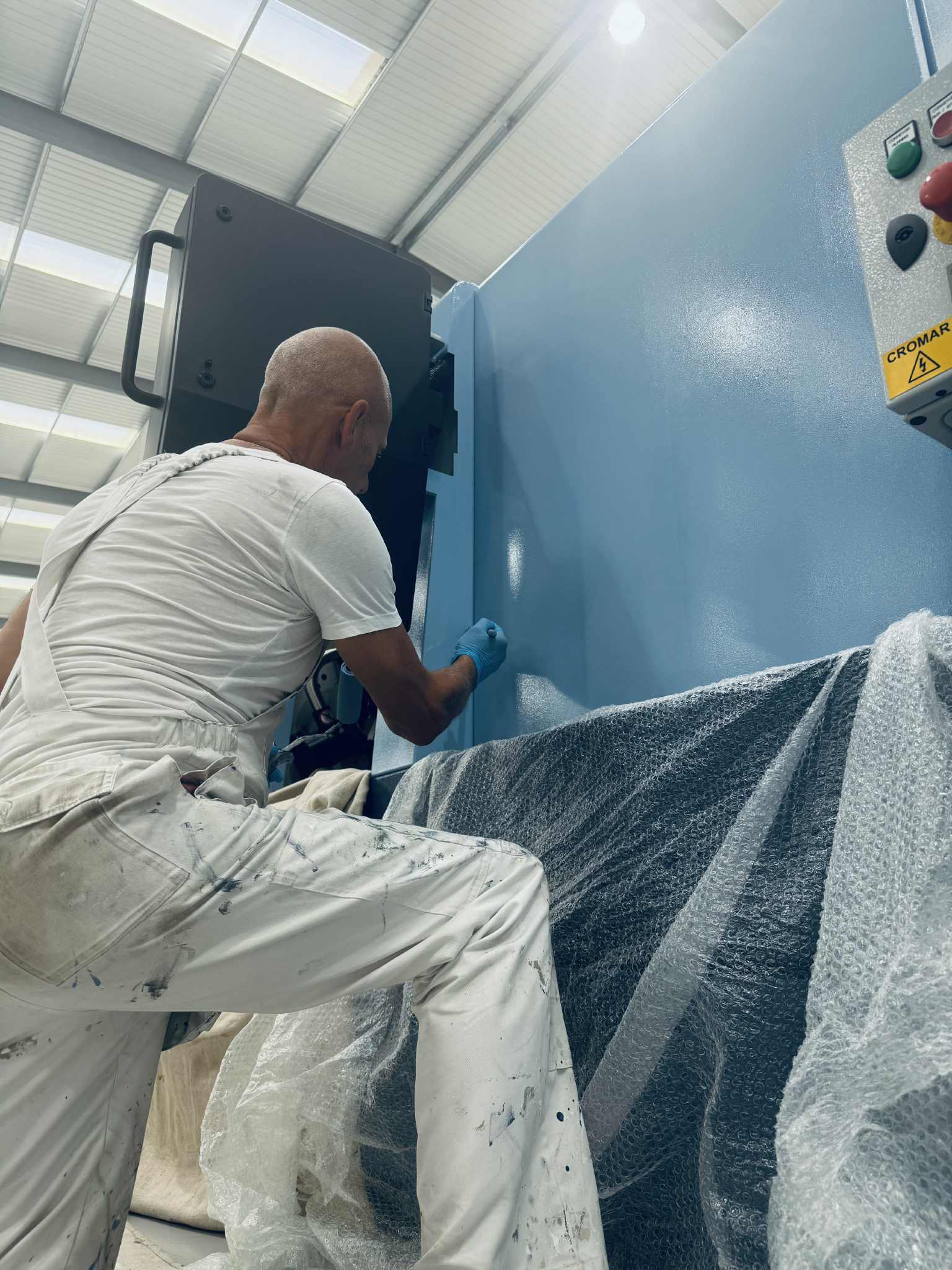 Machine being painted